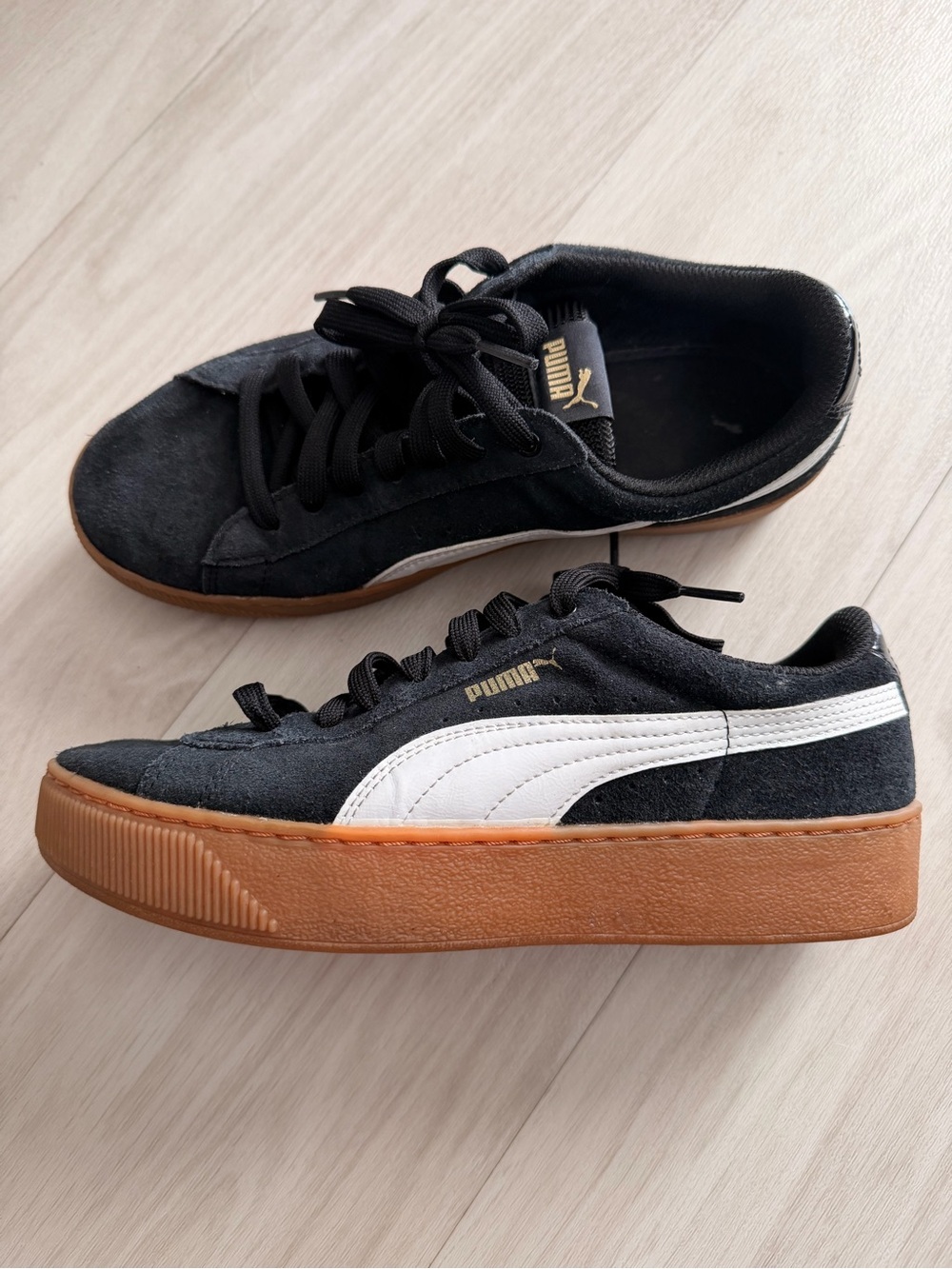 Puma Black Suede Sneakers with White Formstripe and Gum Platform